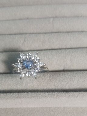 Blue Topaz Halo Flower Cocktail Ring in Stweling Silver